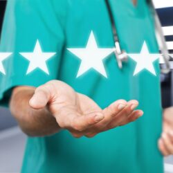 Doctor reviewing a 5 star rating from a patient.