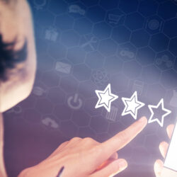 woman using phone for online bad reviews showing star ratings | Vanguard Communications | Denver, CO | San Jose, CA