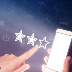 woman using phone for online bad reviews showing star ratings | Vanguard Communications | Denver, CO | San Jose, CA