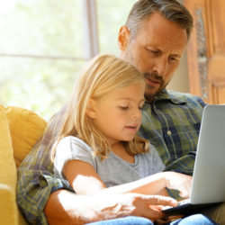 Medical Practice Websites | Vanguard communications | Father and daughter on computer