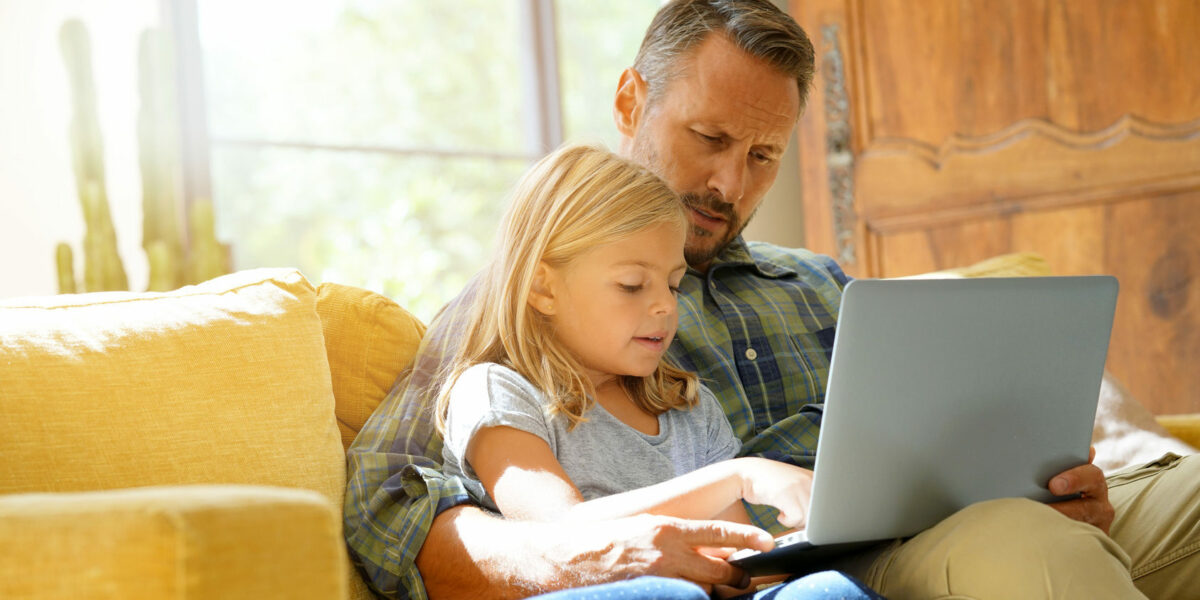 Medical Practice Websites | Vanguard communications | Father and daughter on computer