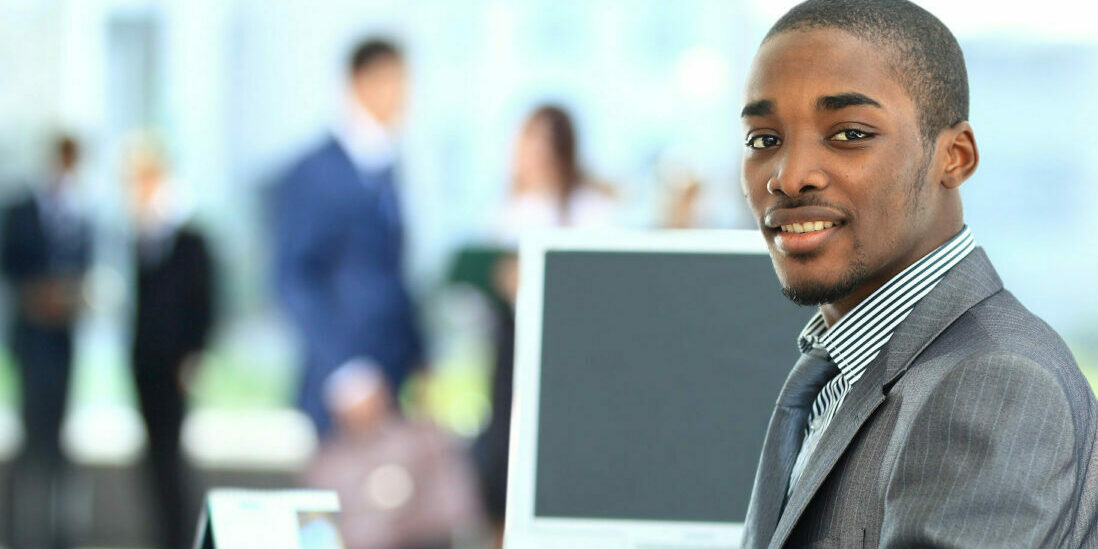 Business case for blogging | Vanguard Communications | African American man at office