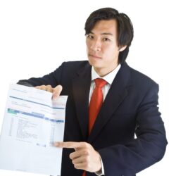 Male bill collector with medical debt bill | Vanguard Communications | Denver
