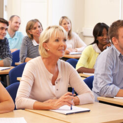 Marketers listening to advice, for an article on marketing principles | Vanguard Communications | Denver